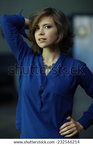 pretty woman in a blue shirt
