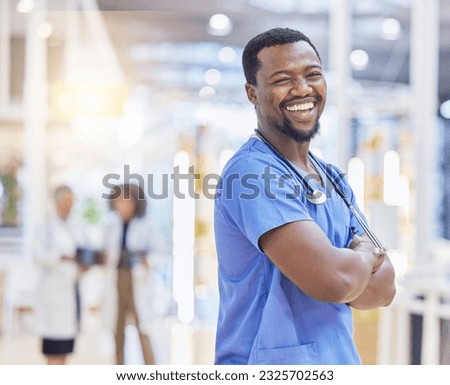 Nurse, portrait and black man with arms crossed, funny and excited in hospital. African surgeon, face and confident medical professional, happy employee or healthcare worker laughing for wellness.