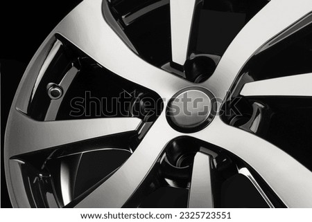 A new cast disc for a close-up car on a black background.