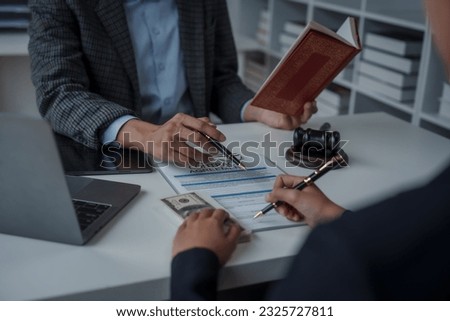 Lawsuits against Real estate agent and realtor general liability insurance businessman professional discussing and consultant with house toy model building before sign a contract with law concept