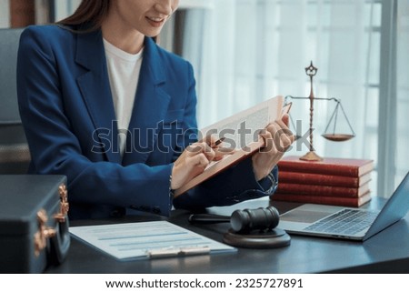 Young business woman lawyer works in office, bookkeeping, audit, stock split, accounting valuation, business combination, marginal deposit, trade account payable, hire purchase, balance sheet account