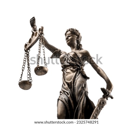 Statue of Lady Justice isolated on white, low angle view. Symbol of fair treatment under law Royalty-Free Stock Photo #2325748291