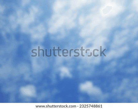 Defocus blue sky with some clouds