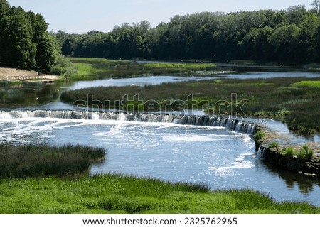 Venta Rapid waterfall (Ventas rumba), in Kuldīga, the widest waterfall in Europe, designated a natural monument of Latvia Royalty-Free Stock Photo #2325762965