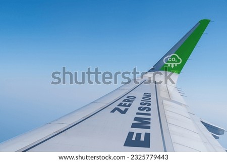 Commercial aircraft wing with zero emissions and CO2 Reduction Icon Royalty-Free Stock Photo #2325779443