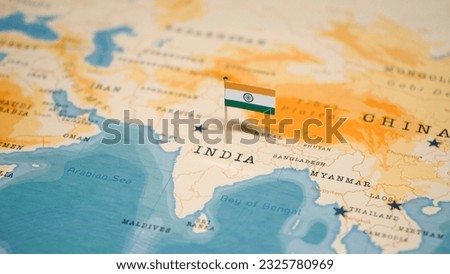 The Flag of India on the World Map. Royalty-Free Stock Photo #2325780969