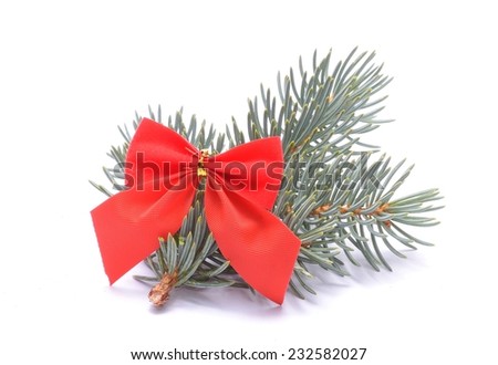 Christmas decorations - red ribbon and white spruce