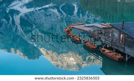 Boats in line - Lago di Braies, 2023, Dolomites, Italy