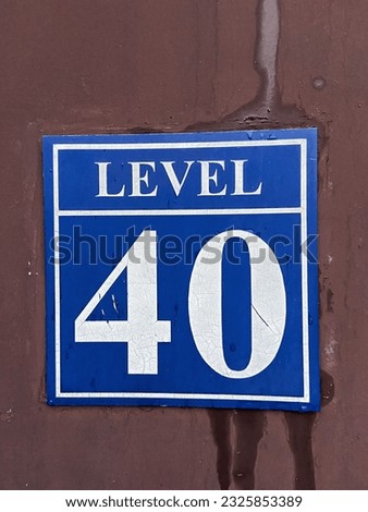 level 40 blue sign on door