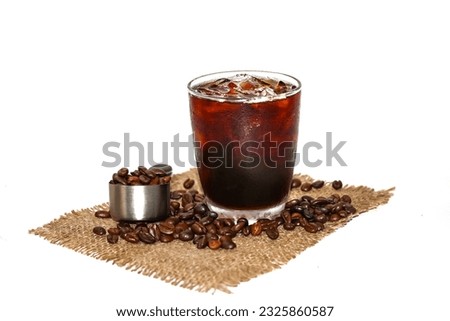 Americano ice coffee and coffee beans spread on the sack in white background.concept isolate picture.
