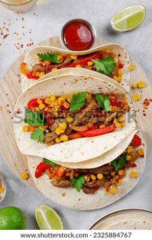 Mexican Tacos with Beef and Vegetables, Tacos al Pastor on Grey Concrete Background