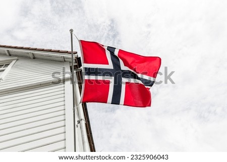 Norwegian flag on a white house