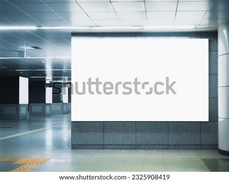 Blank white Mock up light box Banner Media Advertisement in subway station Royalty-Free Stock Photo #2325908419