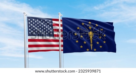 United States and Indiana flags, two flags waving on beautiful sky background