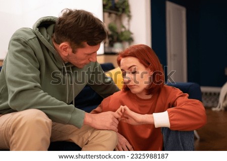 Difficult family conversation, crisis relations, distrust, establishment trusting relationships, after quarrel, tries understanding, offer go family psychologist. Husband and wife support each other