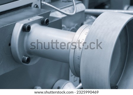 Lathe control knobs close up blue tone. Metal machine tools industry. The metalworking process by turning machine. industry metal processing concept background