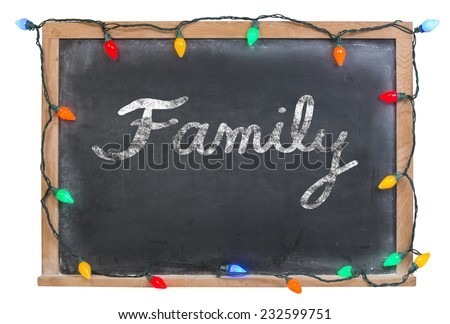 Family written in white chalk on a black chalkboard surrounded with colored lights isolated on white