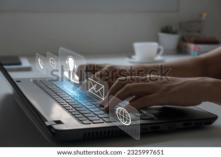 Technical Support Center Customer Service Internet Business Technology Concept. Closeup of hands typing on laptop. Royalty-Free Stock Photo #2325997651