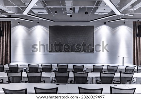 Empty university lecture hall with seating Royalty-Free Stock Photo #2326029497