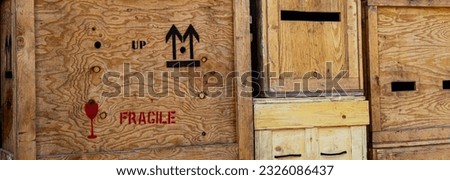 Fragile message type printed on old wooden box