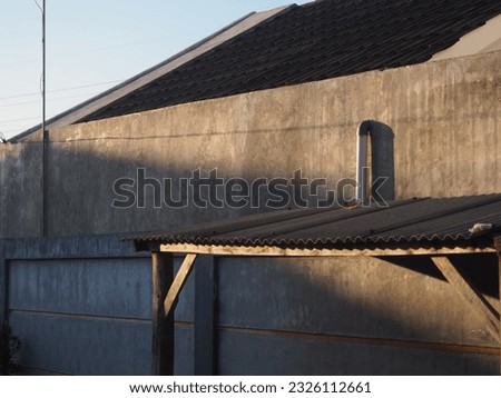 Photograph of a building with exposed cement finish