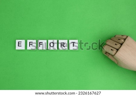 letters of the alphabet with the word effort. the concept of trying or striving for something Royalty-Free Stock Photo #2326167627