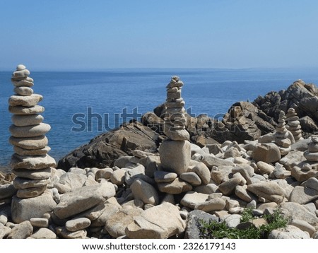 Cairn erected on a pebble beach