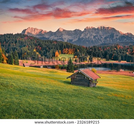 Stunnig evening scene of Wagenbruchsee (Geroldsee) lake with Westliche Karwendelspitze mountain range on background. Amazing autumn sunset in  Bavarian Alps, Germany, Europe.  Royalty-Free Stock Photo #2326189215