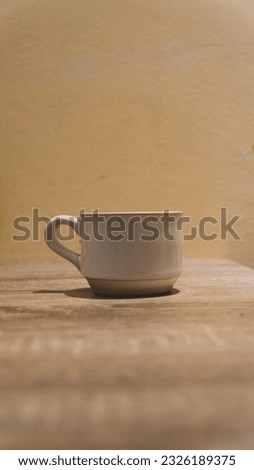white mug brown table background