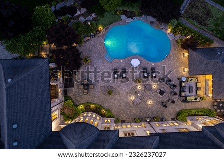 Experience the allure of our luxurious sparkling pool, captured in mesmerizing day and night aerial shots. Indulge in pure bliss and unwind in style. #LuxuryLiving #AerialPhotography #DroneShots #Pool