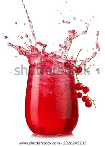 Glass with fresh red currant juice splash on withe background