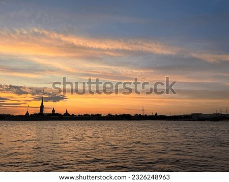 fantastic sunset colors at the city river, tender heaven, riverside