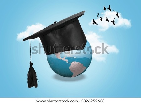International Education concept. Earth globe in a graduation hat Royalty-Free Stock Photo #2326259633