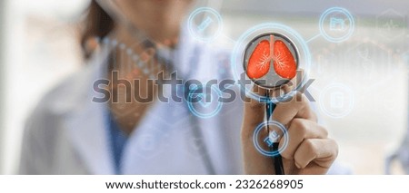Doctor use stethoscope checkup lung health,respiratory disease,lung cancer,bronchitis,Bronchial Asthma,Tuberculosis,pneumonia,asthma,air pollution pm2.5.insurance and hospital.world no tobacco day Royalty-Free Stock Photo #2326268905
