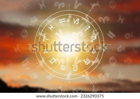 Zodiac wheel with astrological signs on sea background Royalty-Free Stock Photo #2326290375