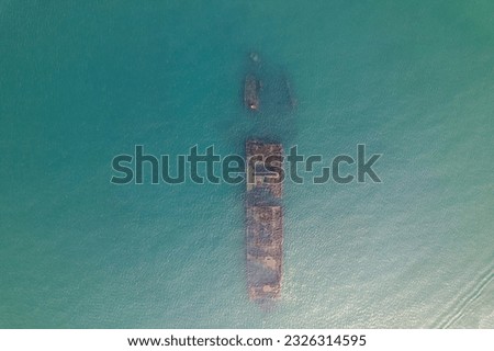 Aerial shot of sunken ship in La Boquita beach