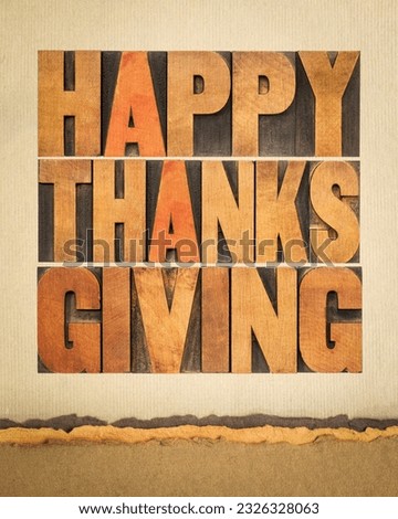 Happy Thanksgiving greeting card - text in vintage letterpress wood type blocks on art paper