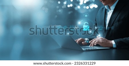 Businessman secures data with encryption and network security, protecting transactions. Cybersecurity for online business, data privacy, and defense against cyber attacks. Royalty-Free Stock Photo #2326331229