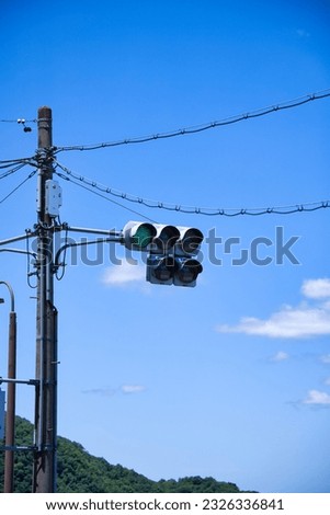 road signal with blue sky and traffic rules