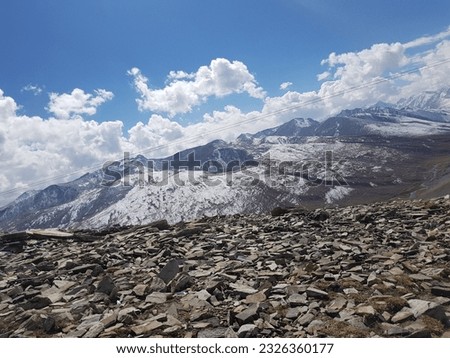 Image of mountains covered by clouds. This seen is very attractive and beautiful  for tourists and people who attract to nature.