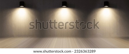 The wall lamp, with its sleek design and soft glow, added a touch of elegance and functionality to the room. Its warm light cascaded gently across the walls,creating cozy ambiance and casting.close up Royalty-Free Stock Photo #2326363289