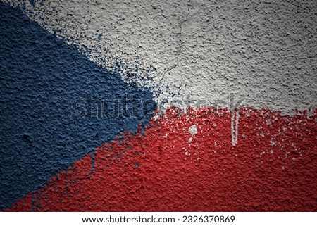 colorful painted big national flag of czech republic on a massive old cracked wall