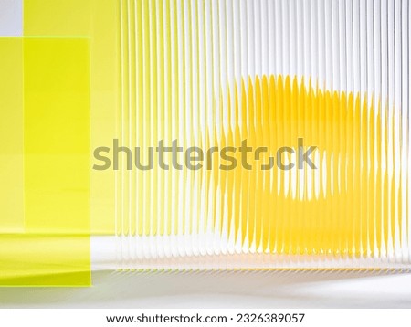 Futuristic simple background made of coloured acrylic glass for perfume or make up. Layered composition provides depth and perspective for product or package promotion. Advertising showcase template.