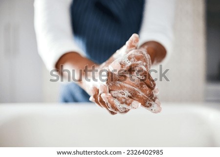 Hands, cleaning and soap with hygiene in bathroom, safety from bacteria and germs, disinfection and skincare. Health, wellness and person at home, sanitizer foam to clean and healthy with handwashing Royalty-Free Stock Photo #2326402985