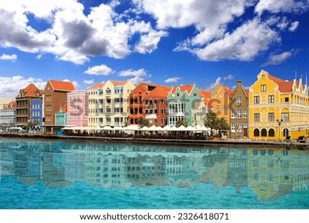 Beautiful sunset sky above Willemstad embankment, Curacao Royalty-Free Stock Photo #2326418071
