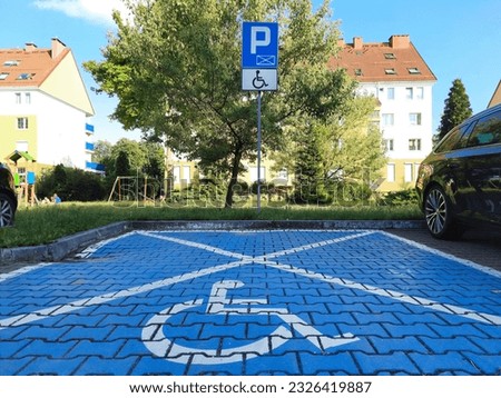 Accessible Parking. Road sign Parking only for disabled drivers. Parking space for disabled individuals, indicated by road markings and information sign. Adapted spaces for disabled person. Inclusion. Royalty-Free Stock Photo #2326419887