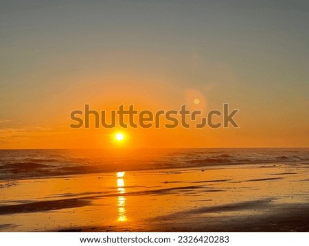 Beautiful beach sunset  so peaceful clear sky . Pictures can be great for poster,postcards. Wallpaper and more
