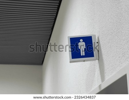 Men public restroom sign in Switzerland mall