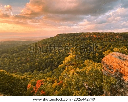 A scenic shot of Hawksbill Crag(Whitaker Point) in Newton County, Arkansas at pinky sunset Royalty-Free Stock Photo #2326442749