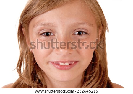 A closeup picture of the face of a eight year old girl, smiling, isolated for white background. 